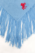 Exaggerated fringe detail on recycled cotton poncho with soft textured movement