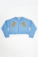Baby blue cotton cropped knit jacket with tan horse design by Suss Knits front view