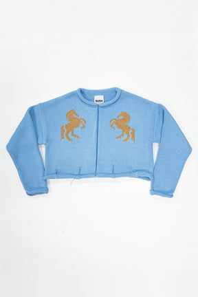 Baby blue cotton cropped knit jacket with tan horse design by Suss Knits front view