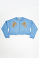 Baby blue cotton cropped knit jacket with tan horse design by Suss Knits front view