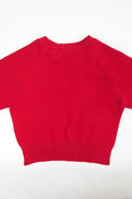The Suss Knits bright Red Open Raglan Knit Top back panel with ribbed hem