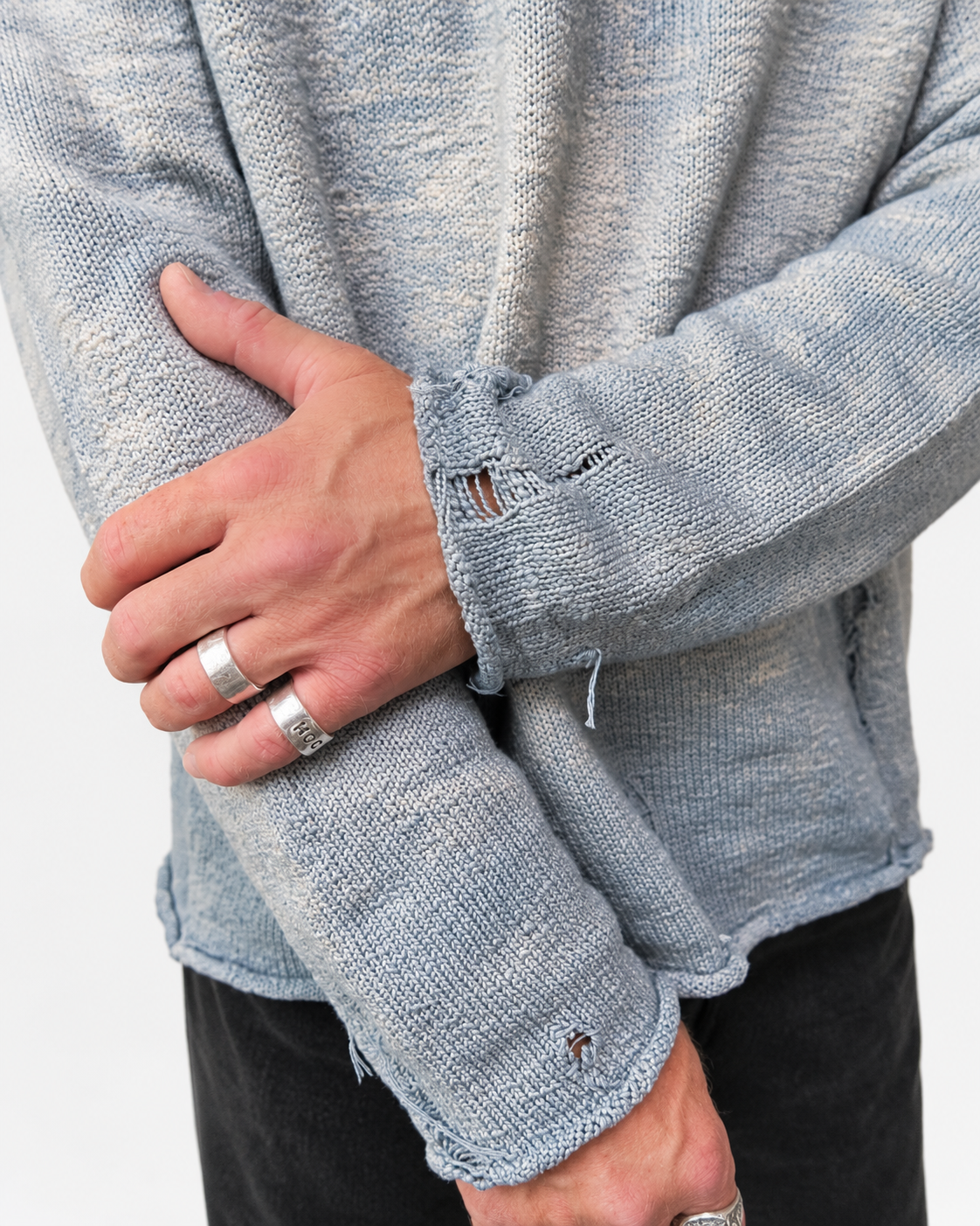 Close-up of Archive Finish Raglan distressed cuff and hand-finished knit details