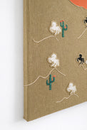 suss knits left angle detail of hand loomed horse appliqués sewn onto knit textile panel