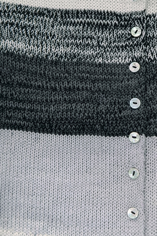 Close-up of hand-sewn shell buttons and tweedy texture on striped knit duster cardigan in recycled cotton