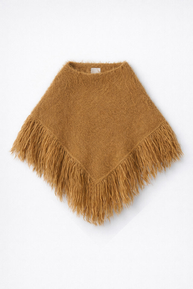 Front flat lay of camel fuzzy texture fringe poncho hand loomed in cotton and viscose knit by Suss Knits