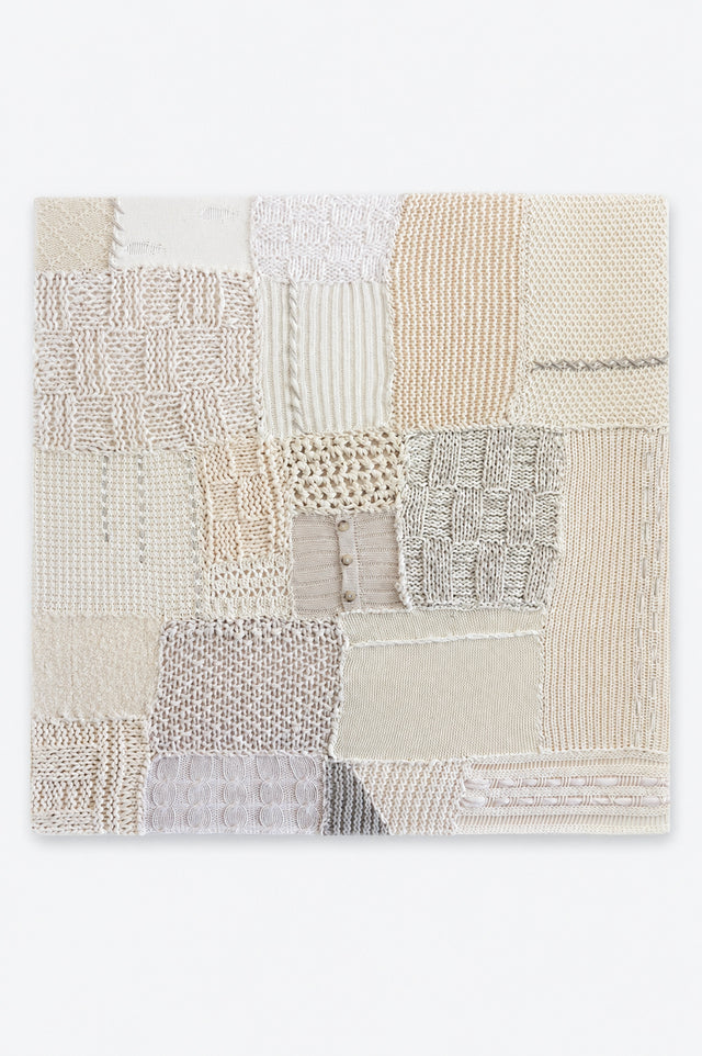Hand knit textile wall art in cream tones, patchwork fiber art made from cotton, wool and cashmere, featuring cable, rib, lace and seed stitch, handmade in Los Angeles by Suss Knits