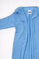 Textured knit and armhole detail of lightweight blue duster cardigan