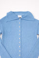 Hand loomed knit collar detail on light denim blue duster cardigan