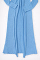 Raw edge hem detail on long blue knit duster open front