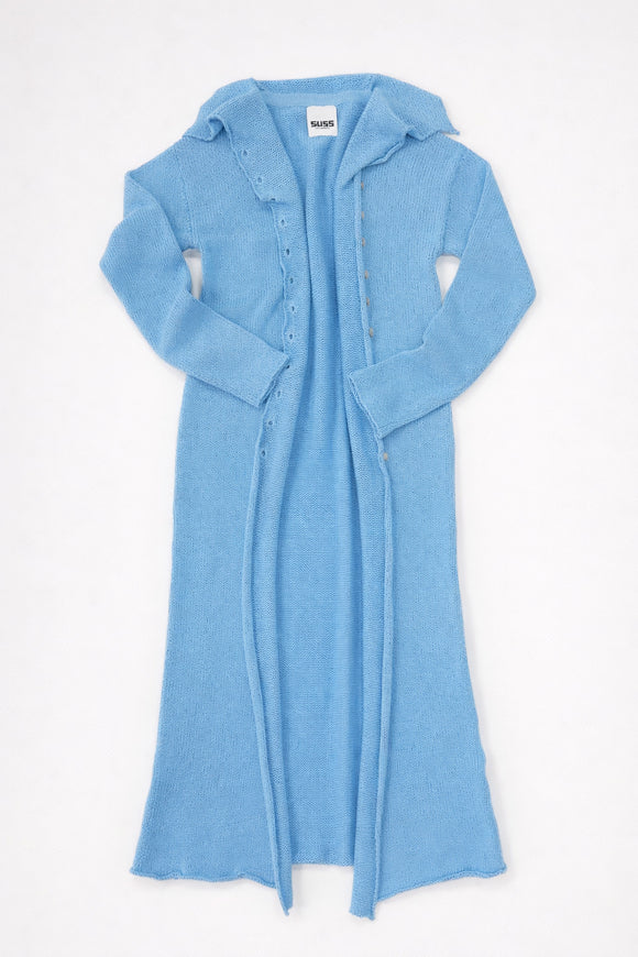Open front knit duster cardigan in light denim blue with raw edges and long length