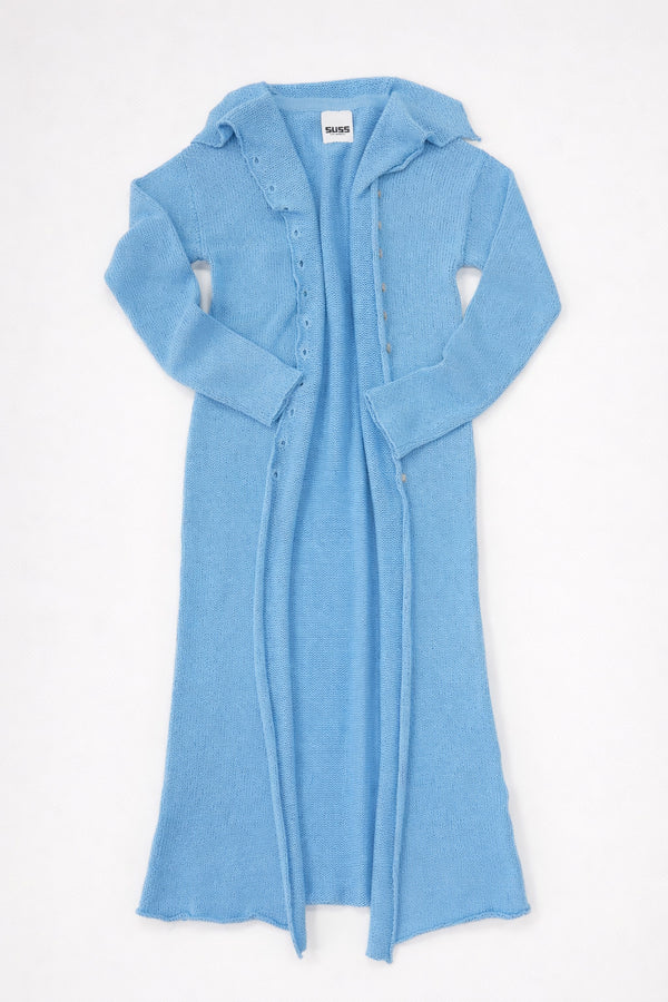 Open front knit duster cardigan in light denim blue with raw edges and long length