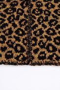 Crochet edge detail on leopard knit cardigan with textured yarn finish