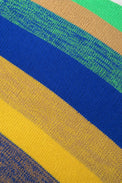 Close up detail view of striped hand loomed poncho bright colorway