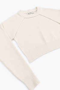 Cream Open Raglan Knit Top angled flat lay showing ribbed hem and cuff knit in cotton and lycra