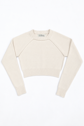 The Suss Knits Cream Open Raglan Knit Top in recycled cotton and lycra, front flat lay