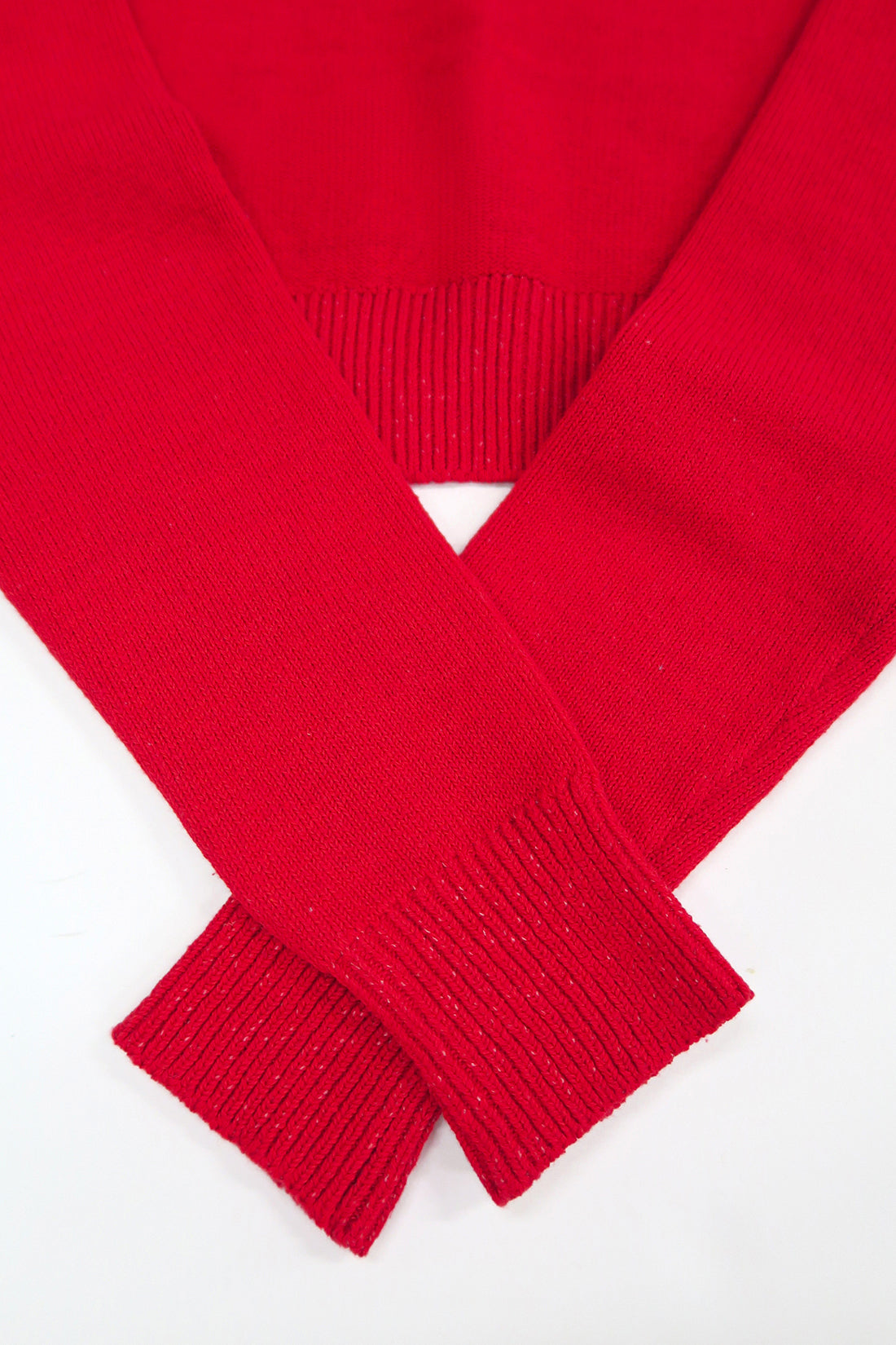 The Suss Knits bright Red Open Raglan Knit Top ribbed cuff detail in cotton and lycra knit, hand loomed in Los Angeles