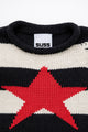 Detail of rollneck, round, neckline of black and cream striped distressed sweater with intarsia red star by Suss Knits