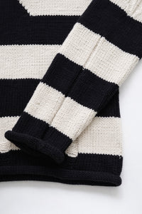 Striped sleeve detail on distressed knit sweater by Suss Knits
