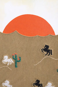 suss knits textile desert landscape with acrylic painted sunset and knit foreground close up