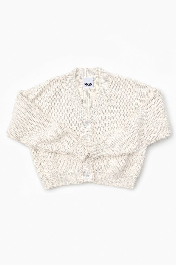 Suss Knits textured hand loomed cardigan flat lay front view in recycled cotton and big shell buttons