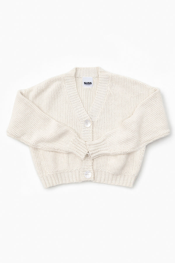 Suss Knits textured hand loomed cardigan flat lay front view in recycled cotton and big shell buttons