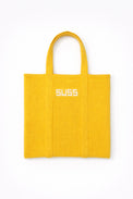 Yellow knit tote bag front view flat lay, hand loomed recycled cotton minimalist design by Suss Knits