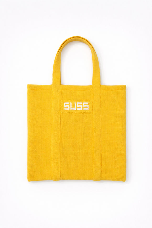 Yellow knit tote bag front view flat lay, hand loomed recycled cotton minimalist design by Suss Knits