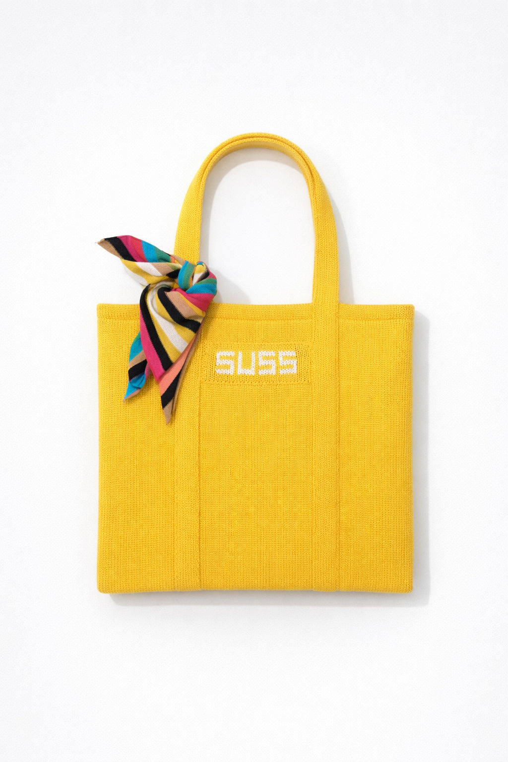 Yellow knit tote bag with multistripe knit scarf flat lay, hand loomed in recycled cotton by Suss Knits