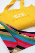 Yellow knit tote bag folded with multistripe scarf styled detail, hand loomed cotton by Suss Knits