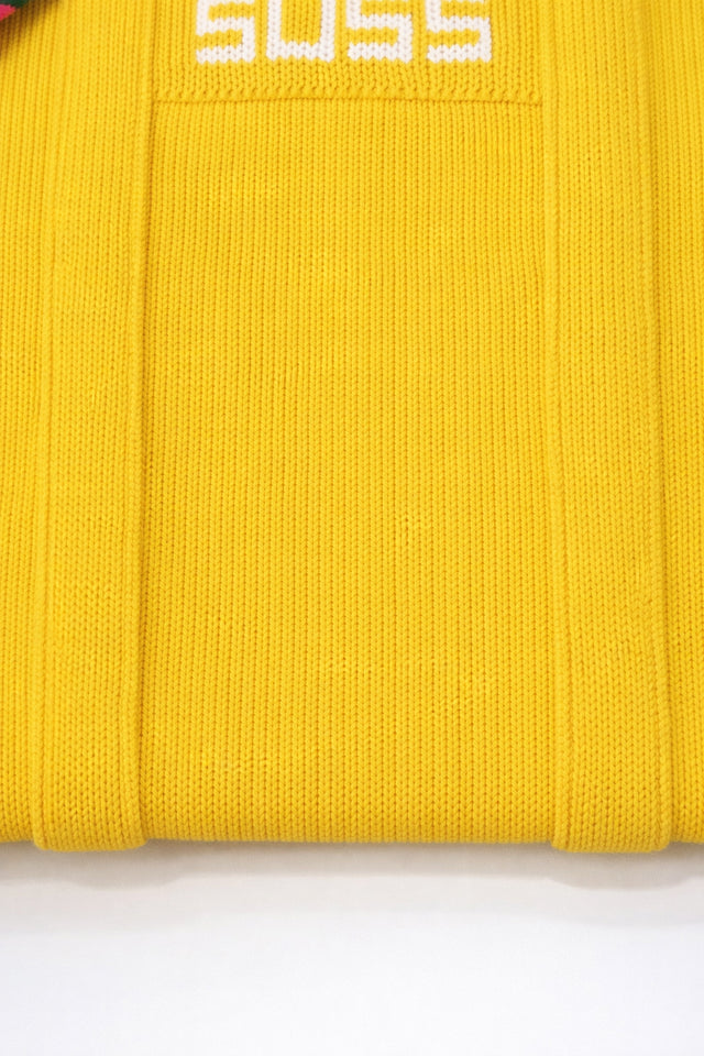 Close up of yellow knit tote bag texture and stitching detail in recycled cotton by Suss Knits