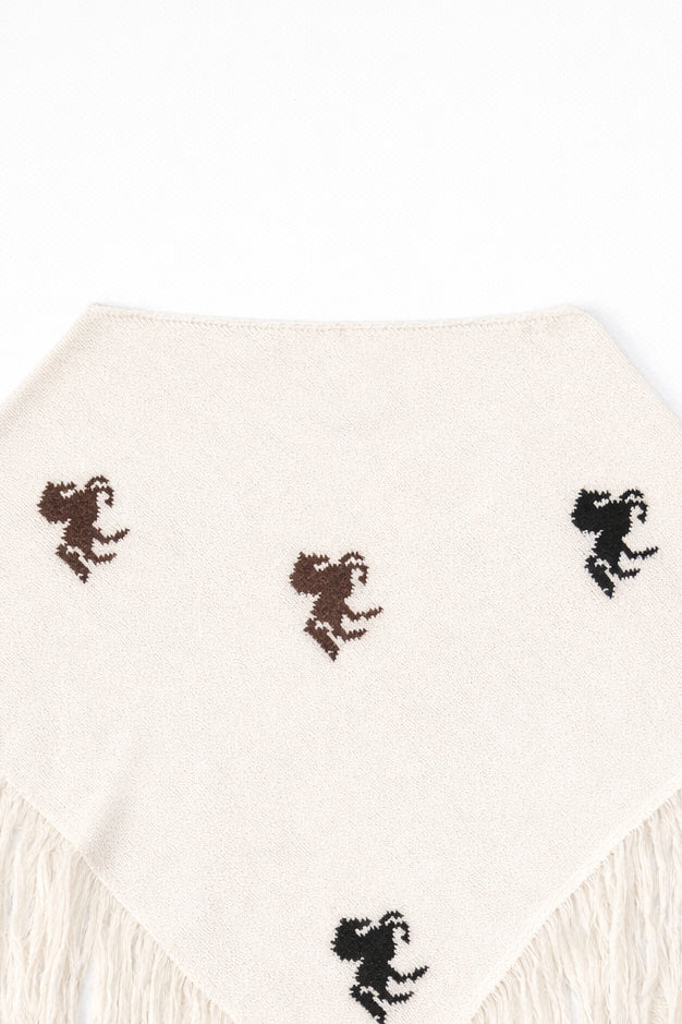 cream knit poncho back view with horse motif and fringe